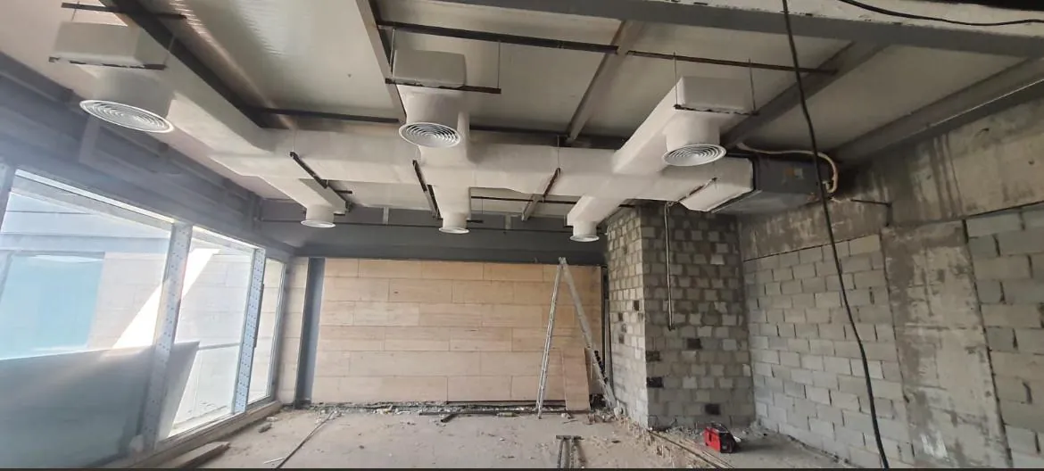 Insulated Circular HVAC Ductwork for a Commercial Tower Office – Kuwait — تركيب دكت تكييف دائري معزول لمكتب في برج تجاري – الكويت