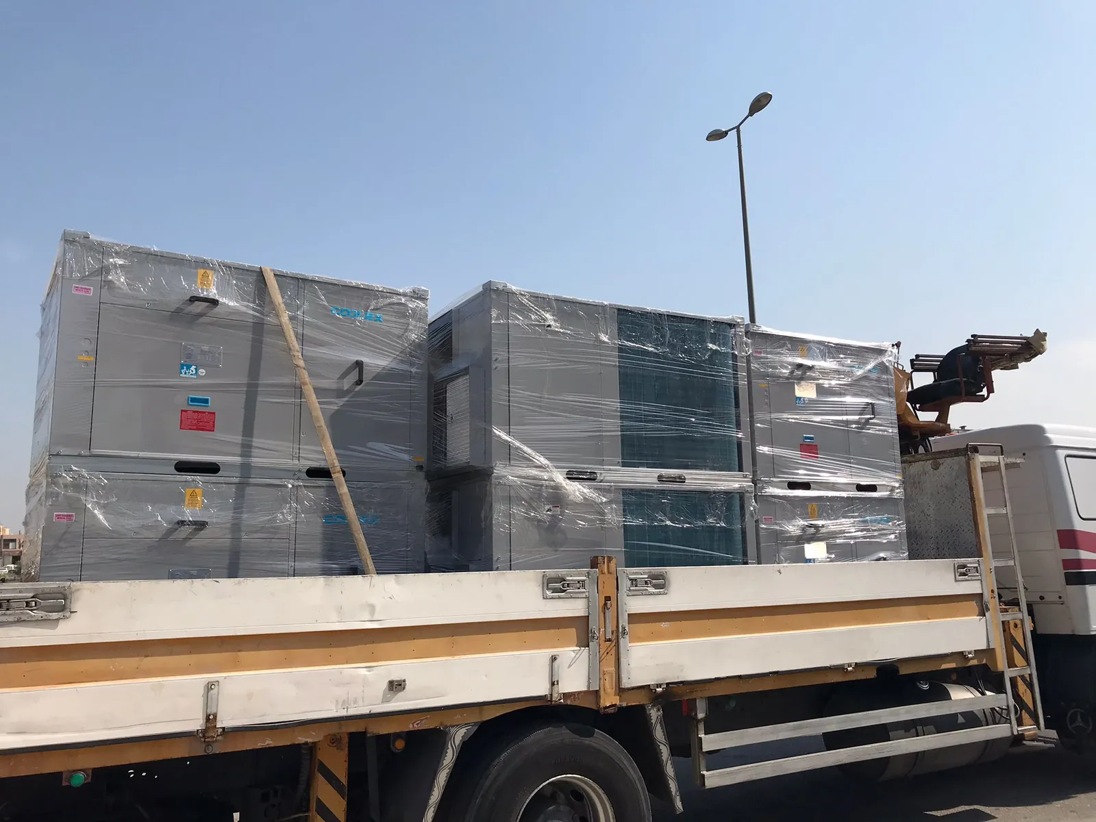 Coolex Rooftop Package AC Supply & Installation Across Multiple Kuwait Projects — توريد وتركيب وحدات Coolex Package لمشاريع متعددة في الكويت
