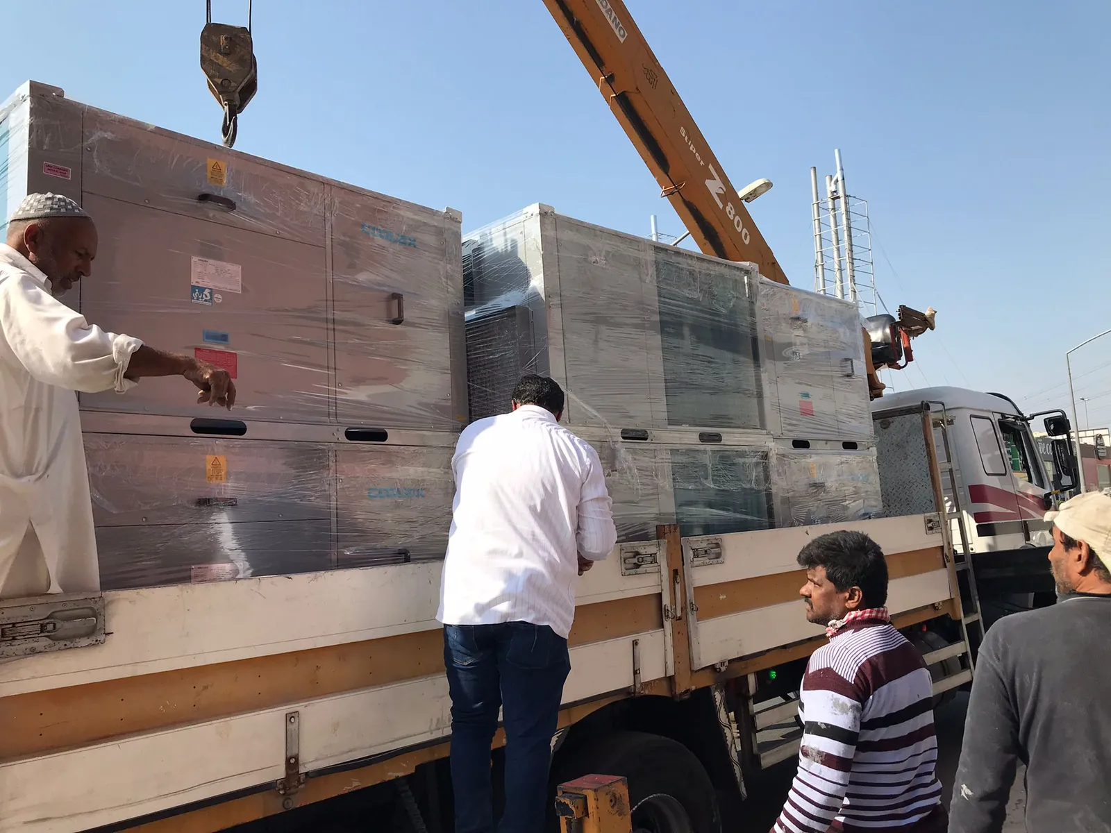 Coolex Rooftop Package AC Supply & Installation Across Multiple Kuwait Projects — توريد وتركيب وحدات Coolex Package لمشاريع متعددة في الكويت