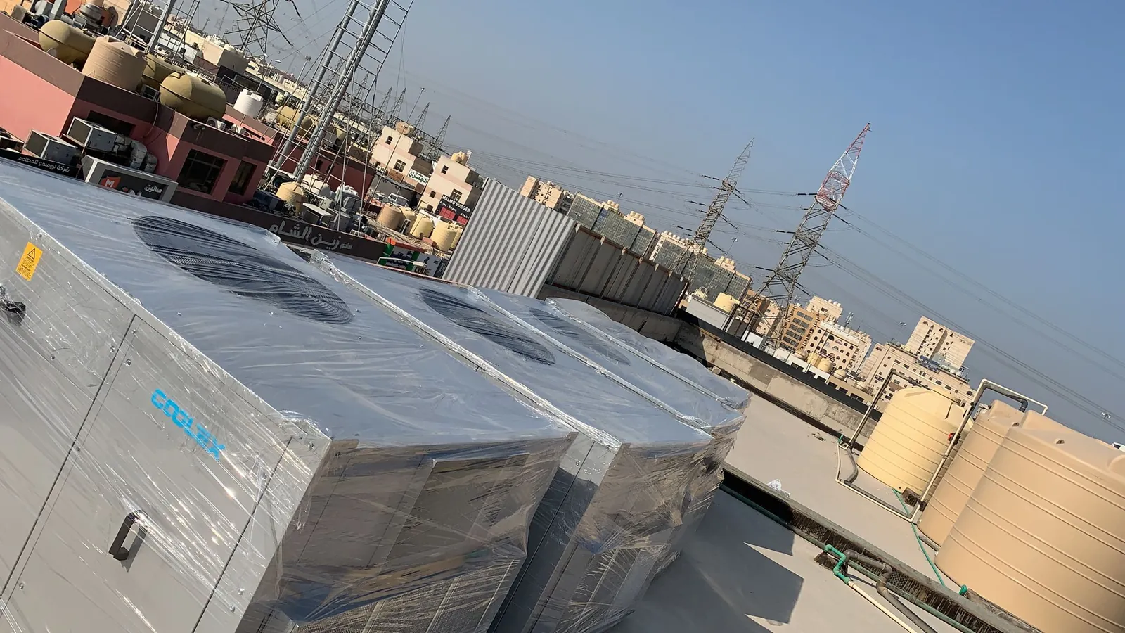 Coolex Rooftop Package AC Supply & Installation Across Multiple Kuwait Projects — توريد وتركيب وحدات Coolex Package لمشاريع متعددة في الكويت